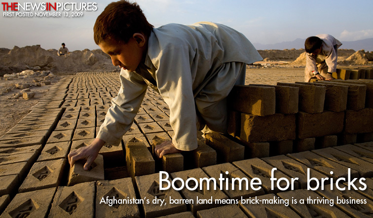 A seven-year-old boy, Roman, sorts bricks at the Sadat brick factory in Kabul where he works every day from 8am to 5pm. Child labour is common in Afghanistan's brick factories where adult workers, desperate to make more money, enlist their children to help with some of the easier jobs.